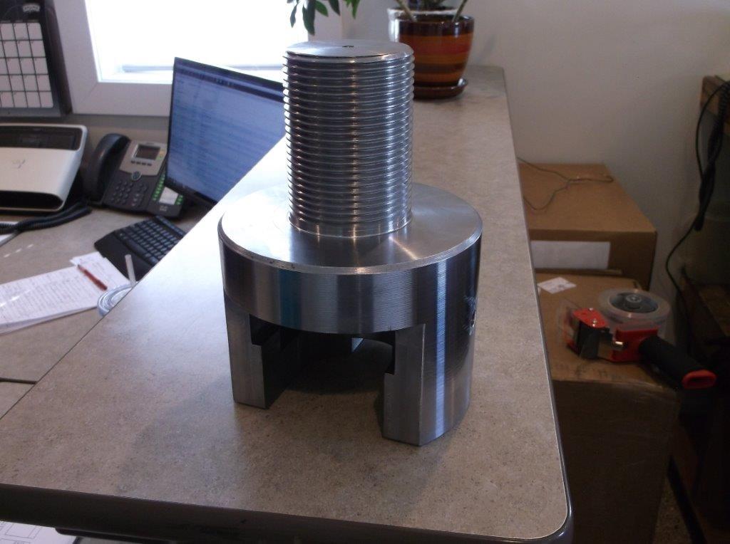 Turned and threaded stainless steel plug with milled slots